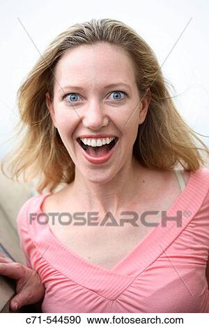 Caucasian woman looking surprised in camera View Large Photo Image Stock Image - Caucasian woman looking surprised in camera. Fotosearch