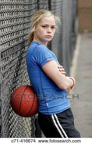 Caucasian woman on basketball court View Large Photo Image Picture - Caucasian woman on basketball court. Fotosearch