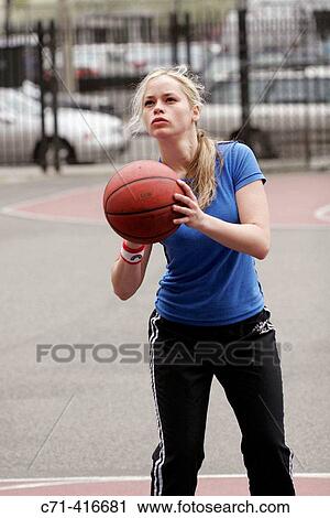 Caucasian woman on basketball court View Large Photo Image Stock Image - Caucasian woman on basketball court. Fotosearch