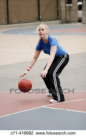 Caucasian woman on basketball court View Large Photo Image Stock Image - Caucasian woman on basketball court. Fotosearch
