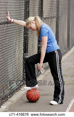 Caucasian woman on basketball court View Large Photo Image Stock Photograph - Caucasian woman on basketball court. Fotosearch