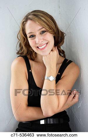 Stock Image - Caucasian woman smiling into the camera. Fotosearch