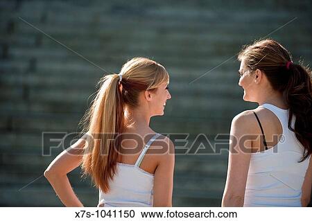 Caucasian women doing workout outside View Large Photo Image Stock Image - Caucasian women doing workout outside. Fotosearch