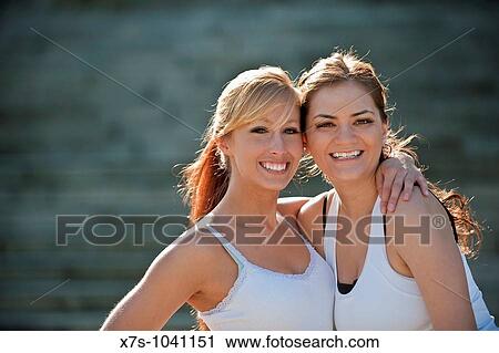 Caucasian women doing workout outside View Large Photo Image Stock Image - Caucasian women doing workout outside. Fotosearch