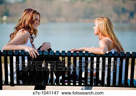 Caucasian women doing workout outside View Large Photo Image Stock Photo - Caucasian women doing workout outside. Fotosearch