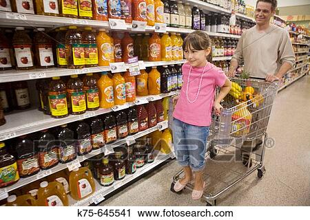 Caucasians, dad, age 30's to 40? s, daughter, age 9, shopping, shopping cart, fruit juice, supermarket View Large Photo Image Stock Image - Caucasians, dad, age 30's to 40? s, daughter, age 9, shopping, shopping cart, fruit juice, supermarket. Fotosearch