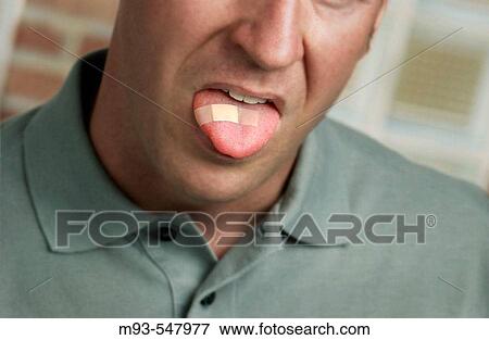 Caucasion man with bandage on tongue; face partially visible. Soft green casual shirt. View Large Photo Image Stock Photo - Caucasion man with bandage on tongue; face partially visible. Soft green casual shirt.. Fotosearch