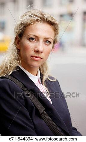 Picture - Caucassian businesswoman looking into camera. Fotosearch