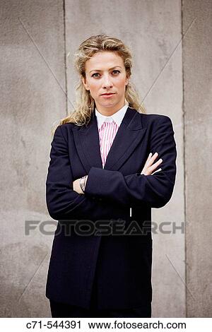 Stock Image - Caucassian businesswoman looking into the camera. Fotosearch