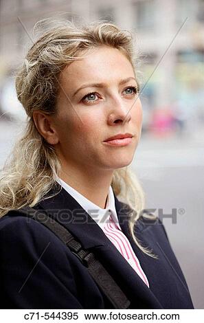 Caucassian businesswoman looking off to the future View Large Photo Image Stock Photography - Caucassian businesswoman looking off to the future. Fotosearch