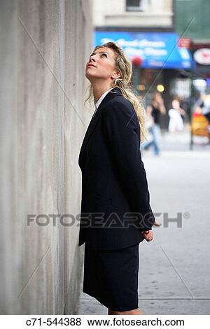 Caucassian woman looking up to the sky View Large Photo Image Stock Photo - Caucassian woman looking up to the sky. Fotosearch