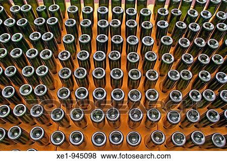 Stock Photo - Cava bottles, decantation, cellar.. Fotosearch
