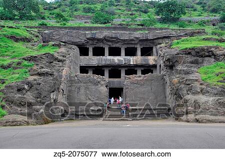 Stock Photo - Cave 12: Teen Tal Facade. Three storied cave has a broad forecourt with three halls. Ellora Caves, Aurangabad.. Fotosearch