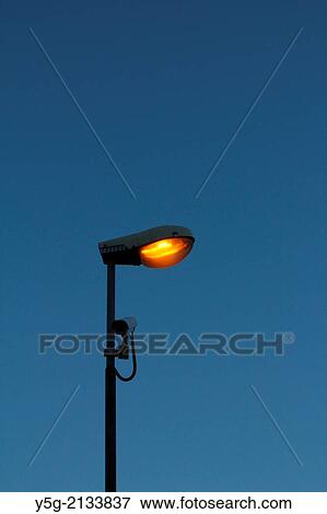 cctv camera on lamp in street road city town at night View Large Photo Image Stock Photo - cctv camera on lamp in street road city town at night. Fotosearch