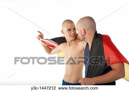 Celebrating soccer fans with German flag View Large Photo Image Stock Image - Celebrating soccer fans with German flag. Fotosearch