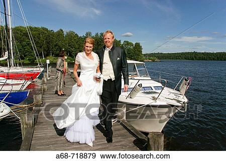 Celebrating the wedding with a boat trip Model release View Large Photo Image Stock Photo - Celebrating the wedding with a boat trip Model release. Fotosearch