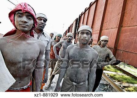 Stock Photo - Cement workers by train, from Jessore to Dhaka, Bangladesh. Fotosearch