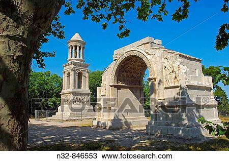 Cenotaph and triumphal arch, Roman ruins of Glanum. Saint-Remy-de-Provence, Provence-Alpes-C? te d? Azur, France View Large Photo Image Stock Image - Cenotaph and triumphal arch, Roman ruins of Glanum. Saint-Remy-de-Provence, Provence-Alpes-C? te d? Azur, France. Fotosearch