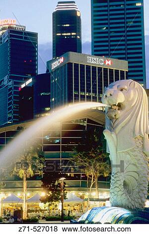 Stock Photo - Central Business District skyline. The Merlion. Singapore.. Fotosearch