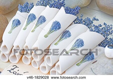 Stock Photo - Ceramic holder for lavender Small hand-crafted vase for holding dried flowers. Fotosearch