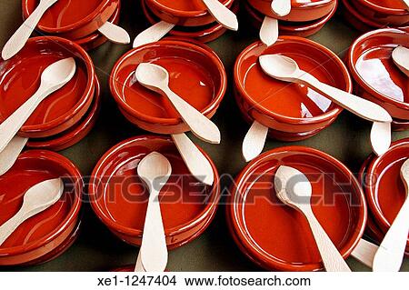 Ceramic pots and wooden spoons. View Large Photo Image Picture - Ceramic pots and wooden spoons.. Fotosearch