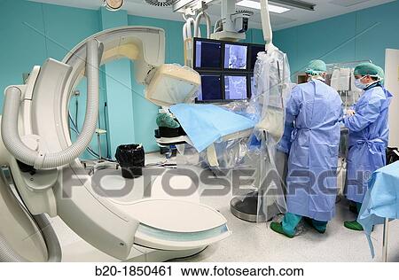 Stock Image - Cerebral aneurysm embolization, Interventional Neuroradiology, Radiology Department, Donostia Hospital, San Sebastian, Donostia, Gipuzkoa, Basque Country, Spain. Fotosearch