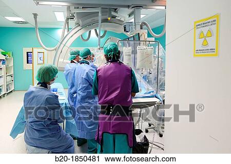 Stock Image - Cerebral aneurysm embolization, Interventional Neuroradiology, Radiology Department, Donostia Hospital, San Sebastian, Donostia, Gipuzkoa, Basque Country, Spain. Fotosearch
