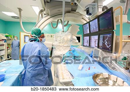 Stock Image - Cerebral aneurysm embolization, Interventional Neuroradiology, Radiology Department, Donostia Hospital, San Sebastian, Donostia, Gipuzkoa, Basque Country, Spain. Fotosearch