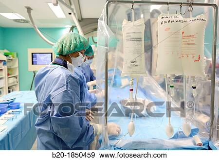 Stock Photo - Cerebral aneurysm embolization, Interventional Neuroradiology, Radiology Department, Donostia Hospital, San Sebastian, Donostia, Gipuzkoa, Basque Country, Spain. Fotosearch