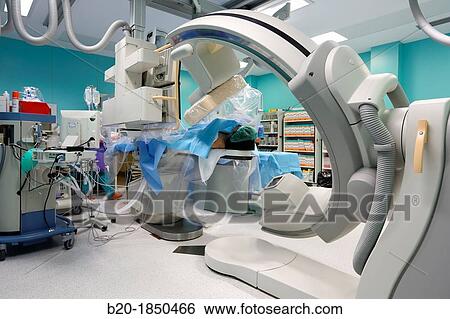 Stock Photograph - Cerebral aneurysm embolization, Interventional Neuroradiology, Radiology Department, Donostia Hospital, San Sebastian, Donostia, Gipuzkoa, Basque Country, Spain. Fotosearch