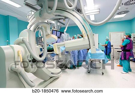 Stock Photograph - Cerebral aneurysm embolization, Interventional Neuroradiology, Radiology Department, Donostia Hospital, San Sebastian, Donostia, Gipuzkoa, Basque Country, Spain. Fotosearch