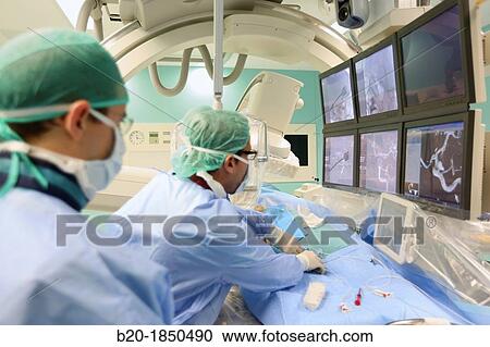 Stock Image - Cerebral aneurysm embolization, Willis polygone Angiography, Interventional Neuroradiology, Radiology Department, Donostia Hospital, San Sebastian, Donostia, Gipuzkoa, Basque Country, Spain. Fotosearch
