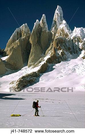 Cerro Torre west face and skier on South Patagonian icecap Los Glaciares National Park Patagonia View Large Photo Image Stock Image - Cerro Torre west face and skier on South Patagonian icecap Los Glaciares National Park Patagonia. Fotosearch