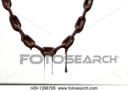 Chain chocolate melts View Large Photo Image Stock Photograph - Chain chocolate melts. Fotosearch