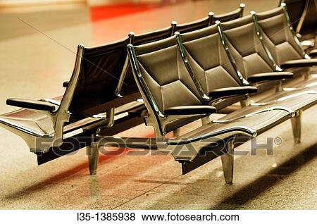 Chairs in the waiting area of??an airport View Large Photo Image Stock Photo - Chairs in the waiting area of??an airport. Fotosearch