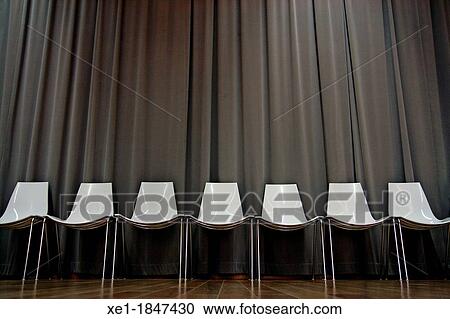 Stock Image - chairs, La Violeta cultural center, Gracia, Barcelona, Catalonia, Spain. Fotosearch
