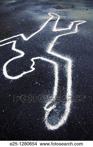 Picture - Chalk outline of body drawn on the floor as if at a crime scene. Fotosearch
