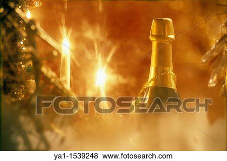 Stock Photo - Champagne bottle and Christmas tree illumination, Christmas market, Place St Louis, Metz, Lorraine region, France. Fotosearch