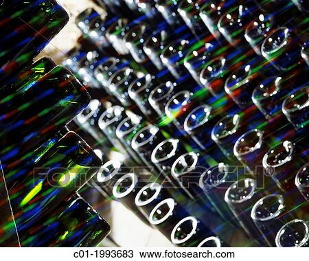 Champagne bottles in? Pupitre? riddling bottle rack Champagne France. View Large Photo Image Stock Image - Champagne bottles in? Pupitre? riddling bottle rack Champagne France.. Fotosearch