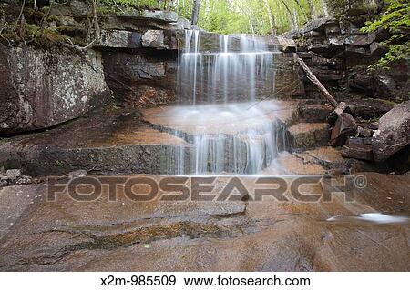 Champney Falls during the spring months Located on Champney Brook next to Champney Falls Trail in Albany, New Hampshire USA View Large Photo Image Stock Photo - Champney Falls during the spring months Located on Champney Brook next to Champney Falls Trail in Albany, New Hampshire USA. Fotosearch