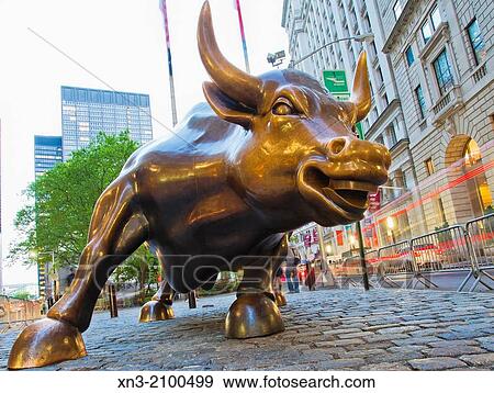 Charging Bull, which is sometimes referred to as the Wall Street Bull or the Bowling Green Bull, bronze sculpture by Arturo Di Modica, Bowling Green Park, Broadway, Lower Manhattan, Financial District, Manhattan, New York City, New York, USA. View Large Photo Image Stock Photo - Charging Bull, which is sometimes referred to as the Wall Street Bull or the Bowling Green Bull, bronze sculpture by Arturo Di Modica, Bowling Green Park, Broadway, Lower Manhattan, Financial District, Manhattan, New York City, New York, USA.. Fotosearch