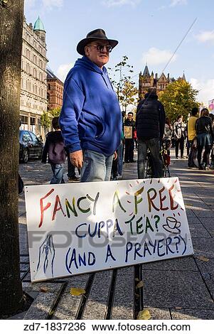 Charity Worker outside Belfast City Hall offering tea and a prayer View Large Photo Image Stock Photograph - Charity Worker outside Belfast City Hall offering tea and a prayer. Fotosearch