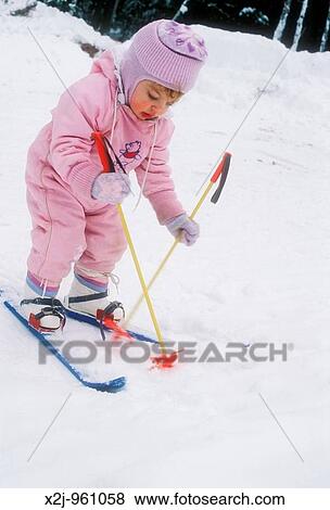 Charlevoix, Michigan - Mariel West, not quite 2, tries cross-country skiing MR View Large Photo Image Stock Photo - Charlevoix, Michigan - Mariel West, not quite 2, tries cross-country skiing MR. Fotosearch