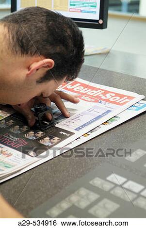 Checking quality View Large Photo Image Stock Photograph - Checking quality. Fotosearch
