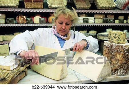 Picture - Cheese: Cantal. Cheese shop? La Ferme Saint-Hubert?. Rue Vignon. Paris.. Fotosearch