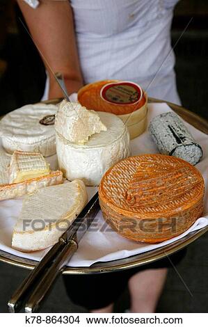 Cheese plate with traditional cheese from Normandy and Brittany, France View Large Photo Image Picture - Cheese plate with traditional cheese from Normandy and Brittany, France. Fotosearch