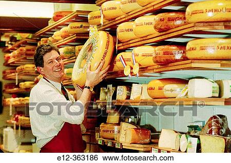 Cheese seller. Gouda. Netherlands. View Large Photo Image Stock Photograph - Cheese seller. Gouda. Netherlands.. Fotosearch