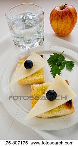 Cheese with black grapes and apples View Large Photo Image Stock Photography - Cheese with black grapes and apples. Fotosearch
