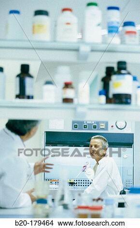 Chemical engineers at research lab View Large Photo Image Picture - Chemical engineers at research lab. Fotosearch