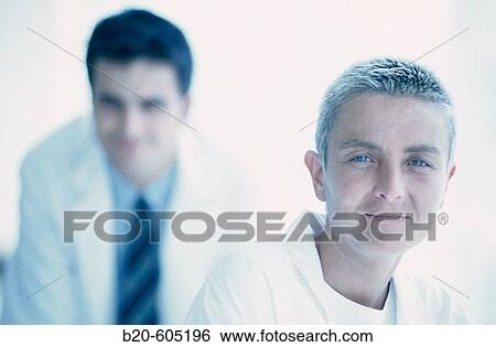 Stock Photograph - Chemical engineers at research lab. Fotosearch